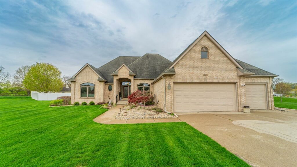 Listed in Crown Point, Indiana -- this ranch sits on 1.15 acres with over 4600+ finished square feet. Features 5 beds, 4 baths, privacy fence, 3 car garage and a finished basement.